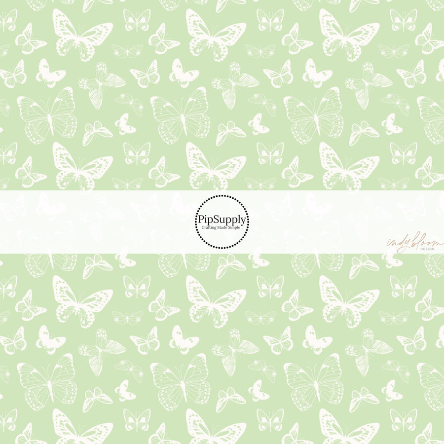 These spring fabric by the yard features boho butterflies on mint. This fun pattern fabric can be used for all your sewing and crafting needs!