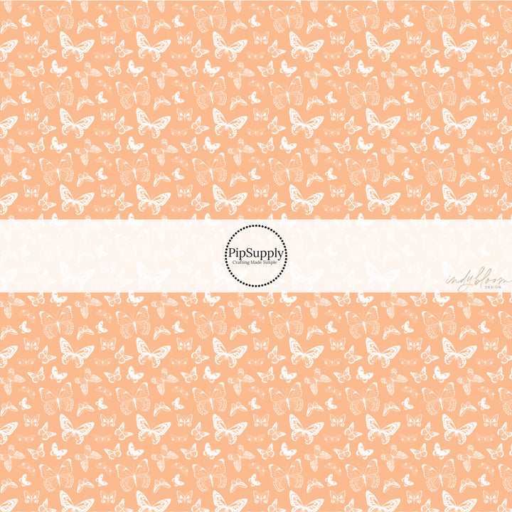 These spring fabric by the yard features boho butterflies on peach. This fun pattern fabric can be used for all your sewing and crafting needs!