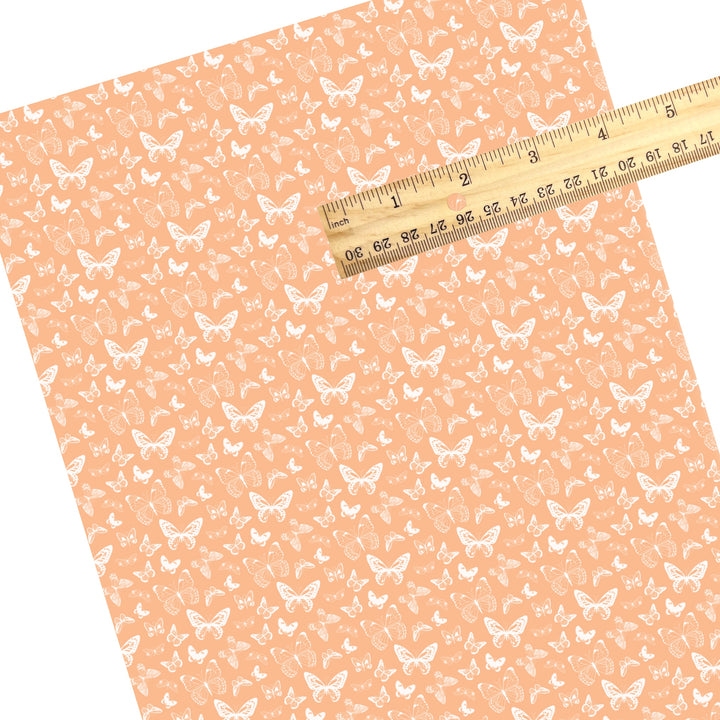 These spring themed faux leather sheets contain the following design elements: boho butterflies on peach. Our CPSIA compliant faux leather sheets or rolls can be used for all types of crafting projects.