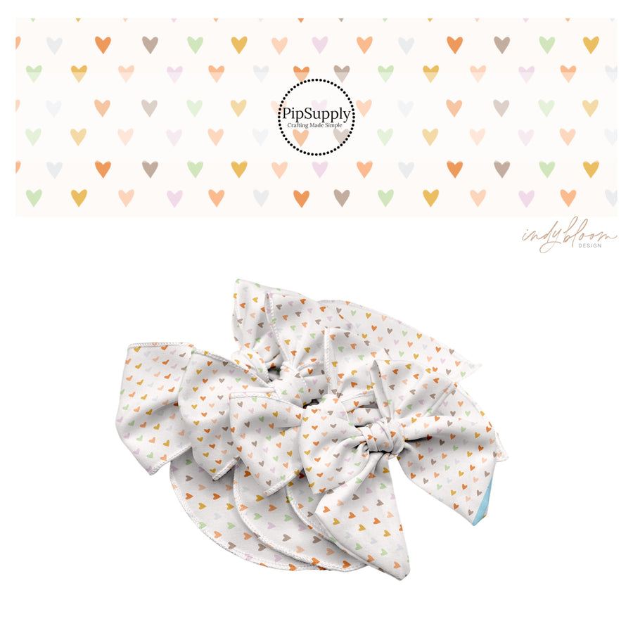 These spring themed no sew bow strips can be easily tied and attached to a clip for a finished hair bow. These bow strips are great for personal use or to sell. These bow strips feature the following design elements: boho pastel heart pattern.