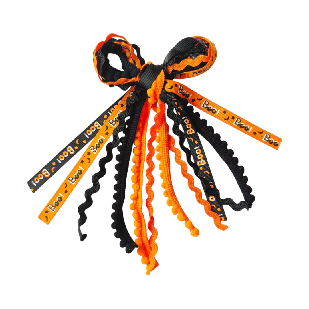 These Halloween colored messy ribbon tied bows are ready to package and resell to your customers no sewing or measuring necessary! These hair bows come with a clip already attached.
