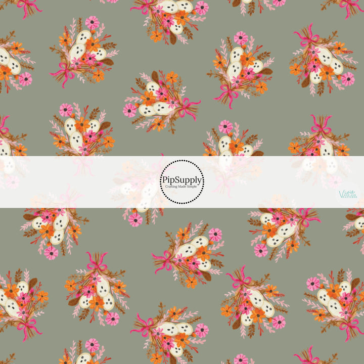 These fall themed pattern fabric by the yard features the following design elements: floral bouquets with ghost. This fun themed fabric can be used for all your sewing and crafting needs!