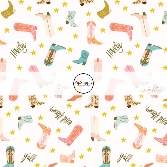 This summer fabric by the yard feature "Howdy" and cowgirl boots on cream. This fun summer western themed fabric can be used for all your sewing and crafting needs!