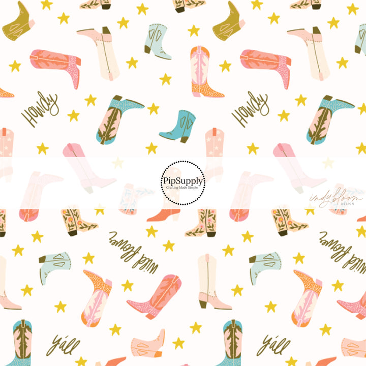 This summer fabric by the yard feature "Howdy" and cowgirl boots on cream. This fun summer western themed fabric can be used for all your sewing and crafting needs!