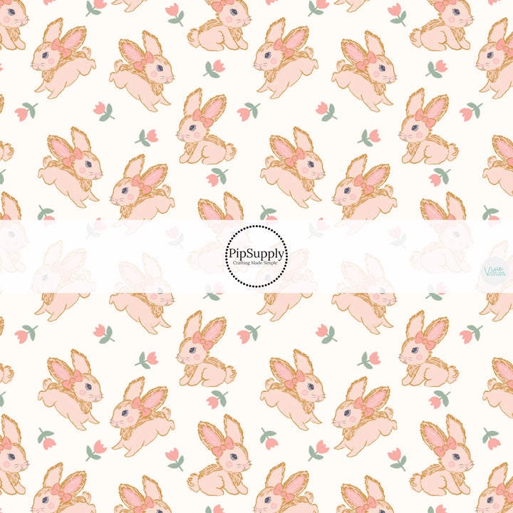 This Easter themed fabric by the yard features bunnies with pink bows surrounded by tulips. This fun pattern fabric can be used for all your sewing and crafting needs!