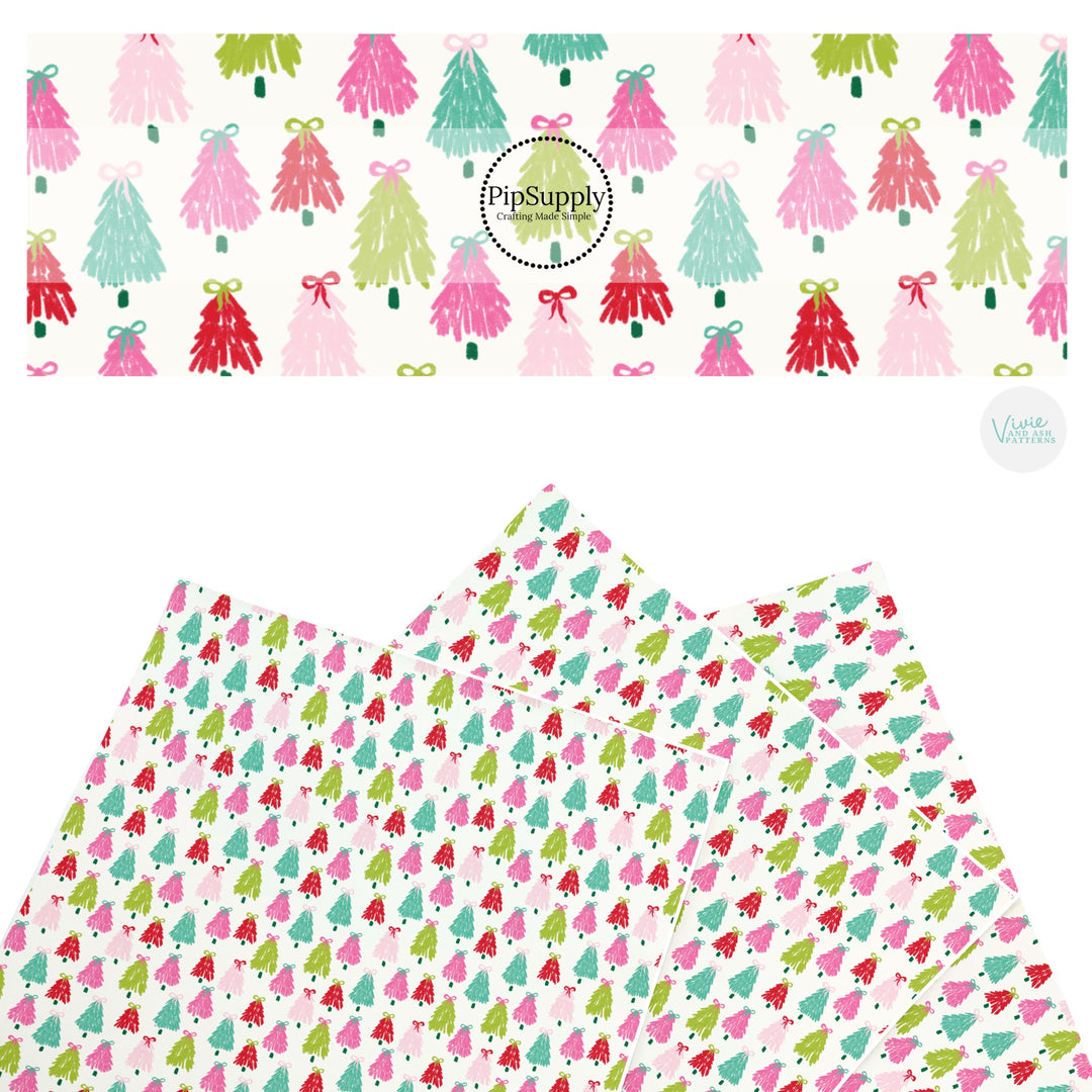 These winter Christmas tree themed pattern faux leather sheets contain the following design elements: colorful Christmas trees with bows. Our CPSIA compliant faux leather sheets or rolls can be used for all types of crafting projects.