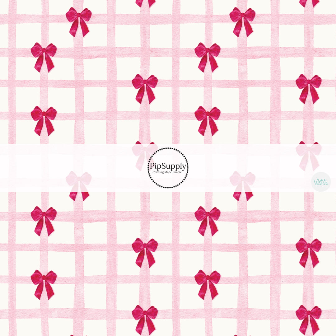 This holiday fabric by the yard features Valentine bows on pink gingham pattern. This festive pattern fabric can be used for all your sewing and crafting needs!