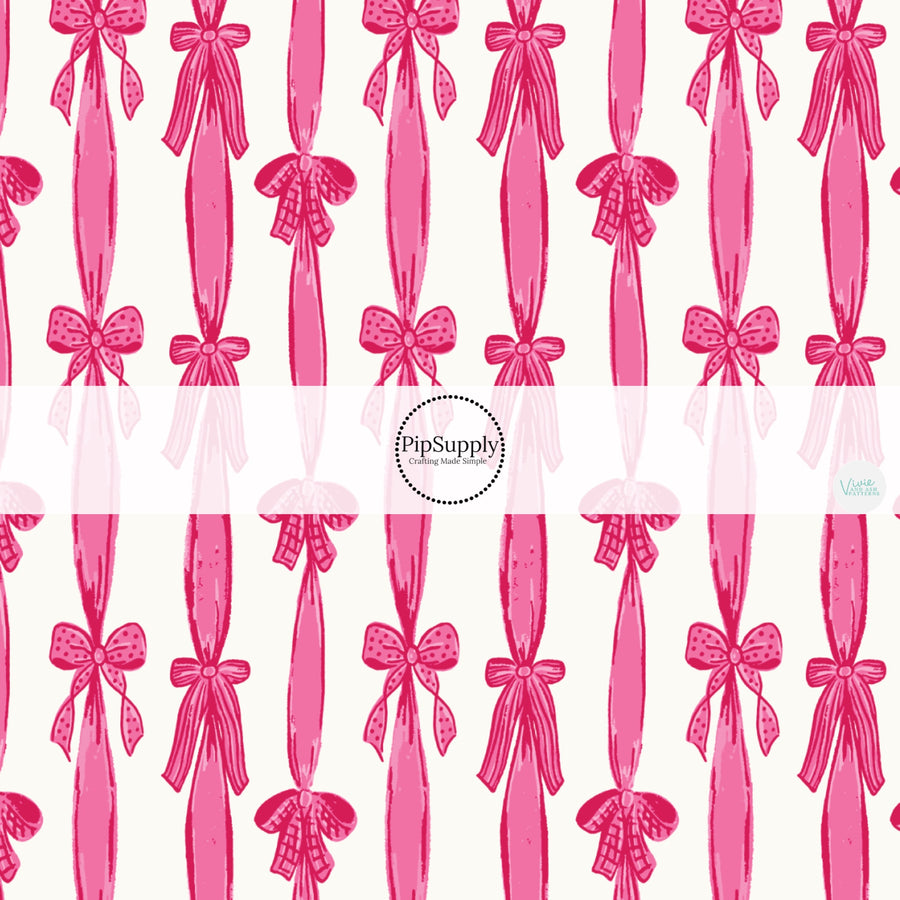 This holiday fabric by the yard features Valentine pink bows. This festive pattern fabric can be used for all your sewing and crafting needs!