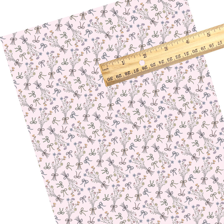 These floral themed faux leather sheets contain the following design elements: bows and bouquets of flowers on pink. Our CPSIA compliant faux leather sheets or rolls can be used for all types of crafting projects.