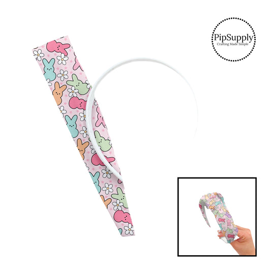 These spring patterned headband kits are easy to assemble and come with everything you need to make your own knotted headband. These kits include a custom printed and sewn fabric strip and a coordinating velvet headband. This cute pattern features bright colored bunnies surrounded by white daisies and tiny stars on light pink.