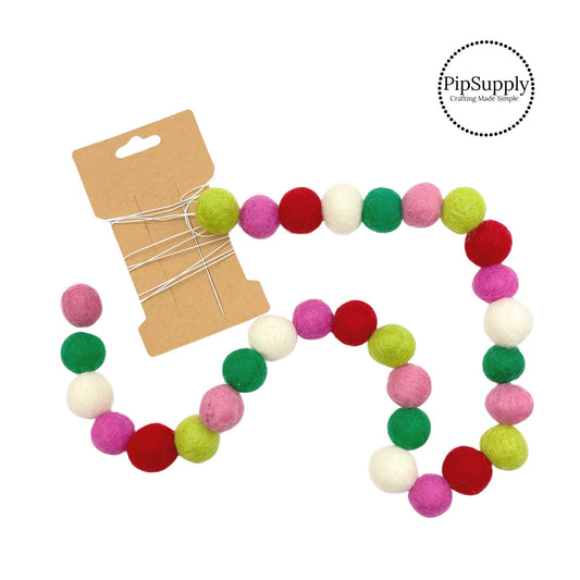 Green, pink, red, and white felt balls garland kit