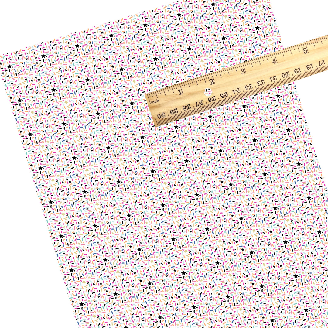 These sprinkle faux leather sheets contain the following design elements: colorful confetti sprinkles. Our CPSIA compliant faux leather sheets or rolls can be used for all types of crafting projects.