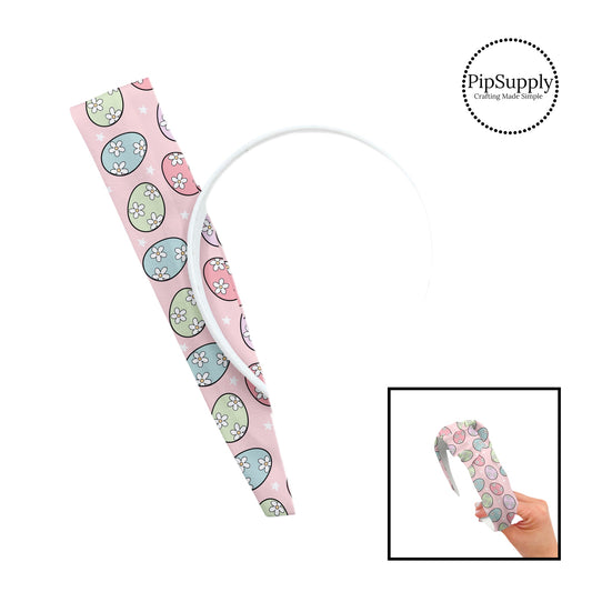 These spring patterned headband kits are easy to assemble and come with everything you need to make your own knotted headband. These kits include a custom printed and sewn fabric strip and a coordinating velvet headband. This cute pattern features pastel colored Easter eggs with white daisies on light pink.