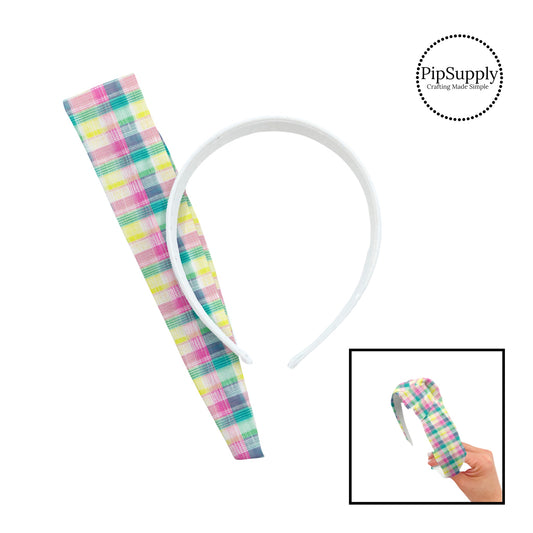 These spring patterned headband kits are easy to assemble and come with everything you need to make your own knotted headband. These kits include a custom printed and sewn fabric strip and a coordinating velvet headband. This cute pattern features light pink, yellow, and green plaid pattern. 