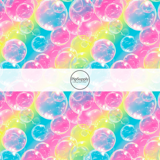 This ombre fabric by the yard features bubble on rainbow ombre pattern. This fun themed fabric can be used for all your sewing and crafting needs!