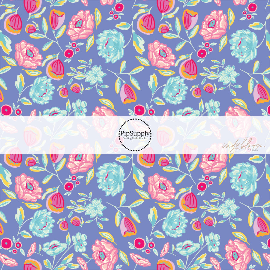 These bright colored flowers on purple fabric by the yard features light blue, teal, mint, orange, light pink, hot pink, red, purple, and lavender flowers and leaves.