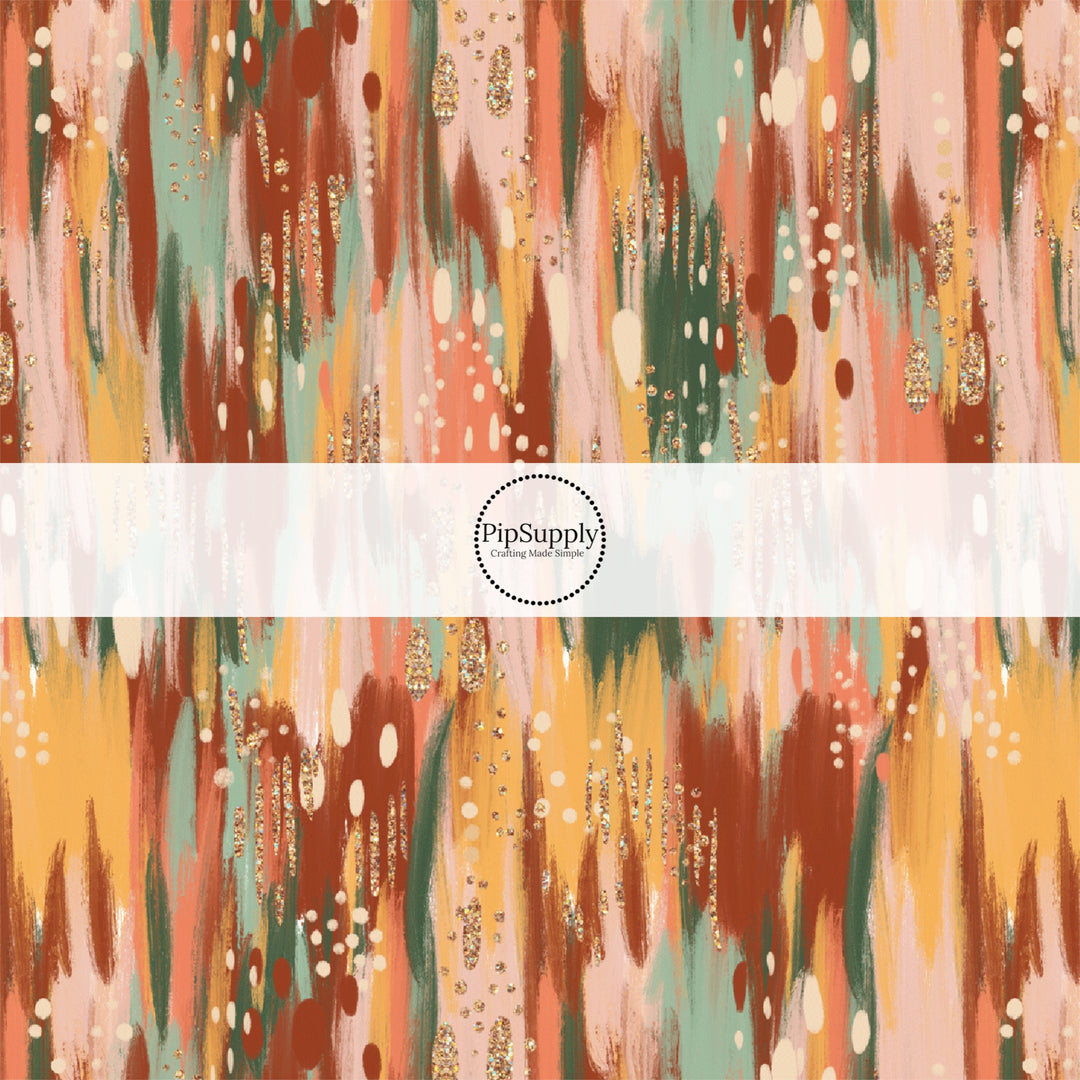 These fall airbrush themed neutral fabric by the yard features splatters in brown, cream, orange, peach, light pink, mint, and dark green along with tiny cream and gold dots. This fun fall themed fabric can be used for all your sewing and crafting needs! 