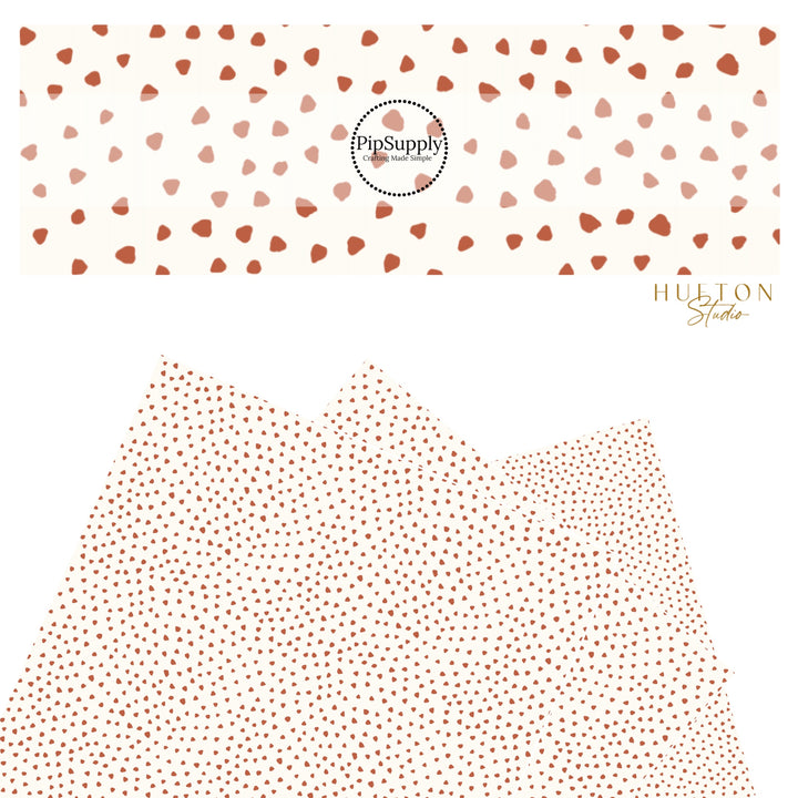 These speckled themed faux leather sheets contain the following design elements: small brown speckled dots on ivory. Our CPSIA compliant faux leather sheets or rolls can be used for all types of crafting projects.