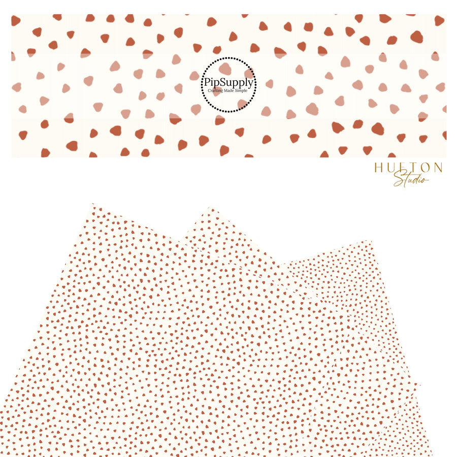 These speckled themed faux leather sheets contain the following design elements: small brown speckled dots on ivory. Our CPSIA compliant faux leather sheets or rolls can be used for all types of crafting projects.