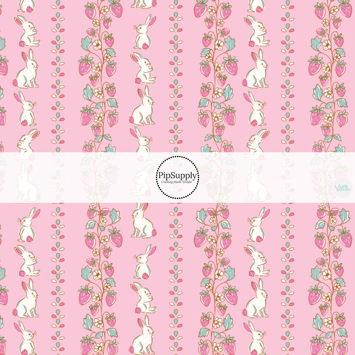 This Easter themed fabric by the yard features white bunnies and strawberries on pink. This fun pattern fabric can be used for all your sewing and crafting needs!