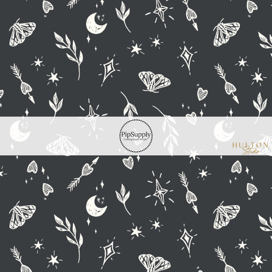 These Halloween themed black fabric by the yard features cream leaves, moths, hearts, moons, and stars on black. This fun themed fabric can be used for all your sewing and crafting needs! 