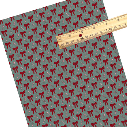 These winter bow themed pattern faux leather sheets contain the following design elements: candy canes and red bows. Our CPSIA compliant faux leather sheets or rolls can be used for all types of crafting projects.