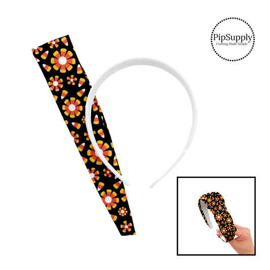 Scattered candy corn and candy corn patterned flowers on black knotted headband kit