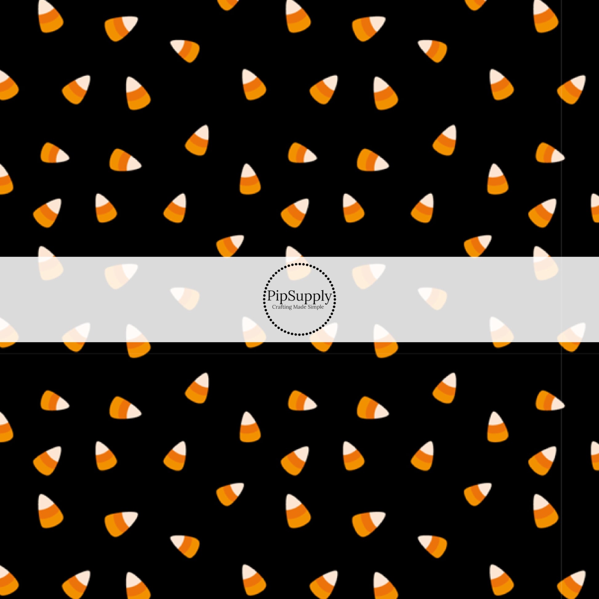 Orange candy corns scattered on black hair bow strips