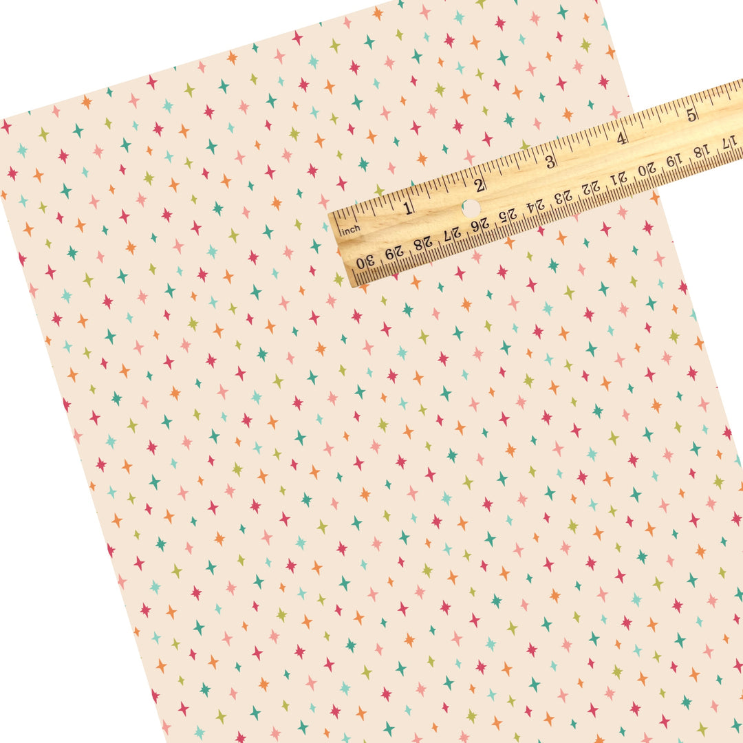 These winter sparkle themed pattern faux leather sheets contain the following design elements: colorful tiny sparkles on cream. Our CPSIA compliant faux leather sheets or rolls can be used for all types of crafting projects.