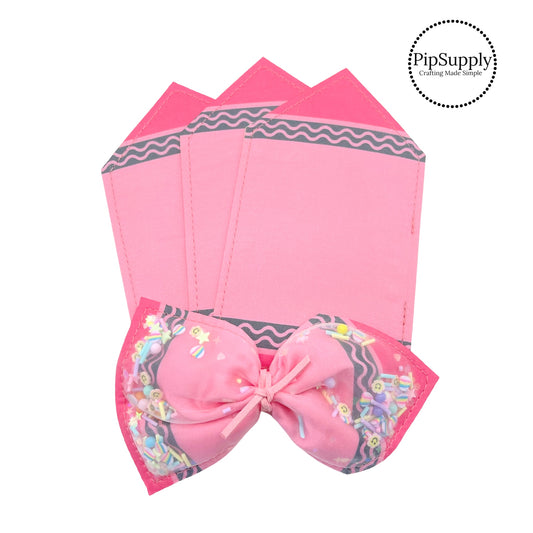 Pink crayon patterned shaker hair bow