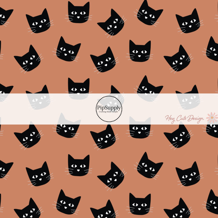 These Halloween themed pattern fabric by the yard features the following design elements: black cats on orange. This fun spooky themed fabric can be used for all your sewing and crafting needs!