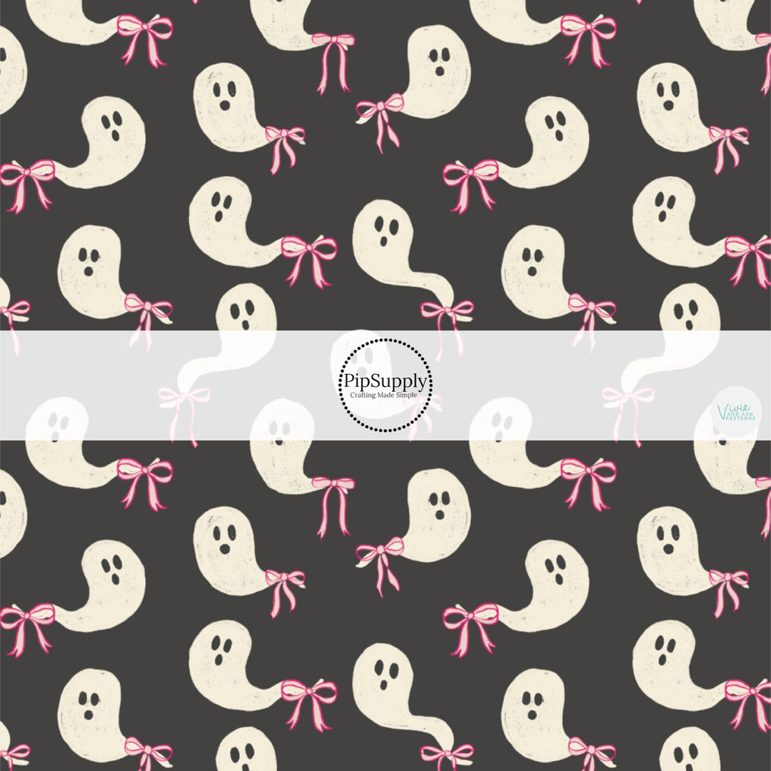 These Halloween themed pattern fabric by the yard features the following design elements: ghost with pink bows on black. This fun spooky themed fabric can be used for all your sewing and crafting needs!