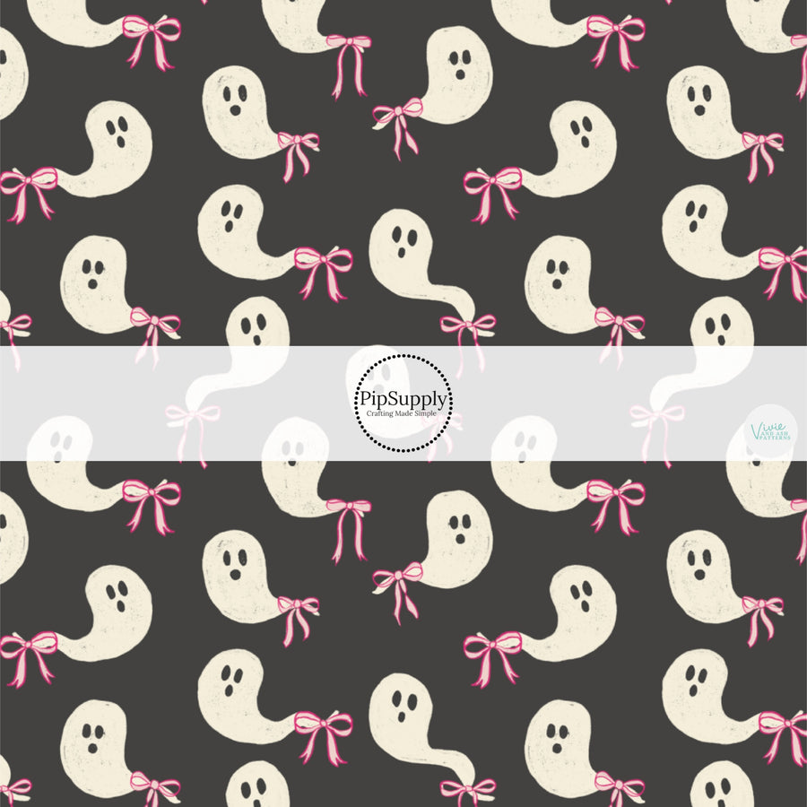 These Halloween themed pattern fabric by the yard features the following design elements: ghost with pink bows on black. This fun spooky themed fabric can be used for all your sewing and crafting needs!