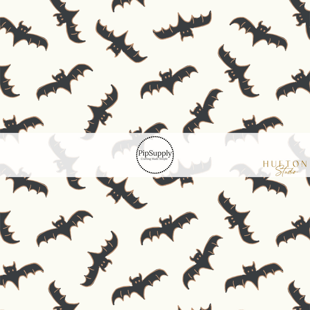 These Halloween themed pattern fabric by the yard features the following design elements: bats on cream. This fun spooky themed fabric can be used for all your sewing and crafting needs!