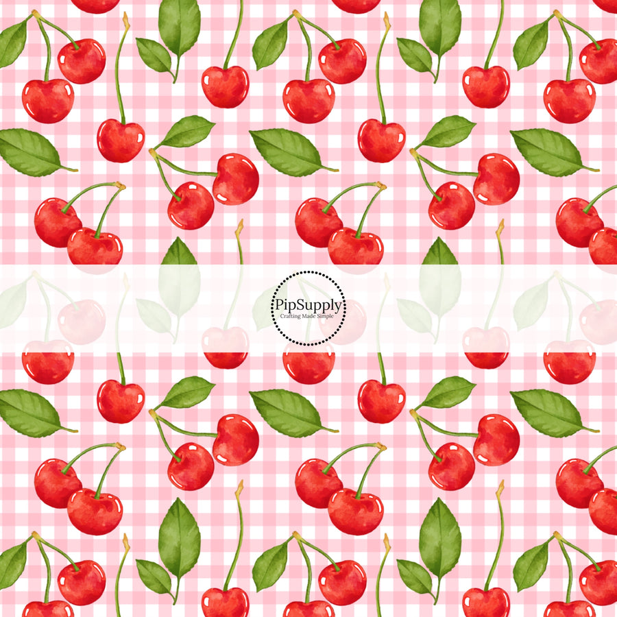 This fruit fabric by the yard features red cherries on a pink and white gingham pattern. This fun pattern fabric can be used for all your sewing and crafting needs!