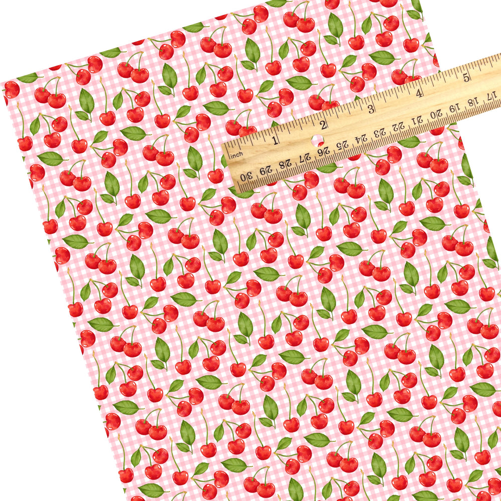 These spring themed faux leather sheets contain the following design elements: red cherries on a pink and white gingham pattern. Our CPSIA compliant faux leather sheets or rolls can be used for all types of crafting projects.