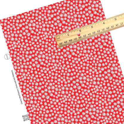 These 4th of July faux leather sheets contain the following design elements: daisies on cherry red. Our CPSIA compliant faux leather sheets or rolls can be used for all types of crafting projects.