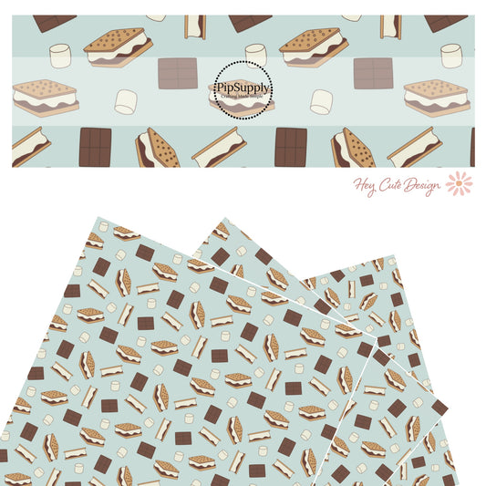 These camping smores light blue faux leather sheets contain the following design elements: chocolate, graham crackers, and marshmallows on pastel blue. Our CPSIA compliant faux leather sheets or rolls can be used for all types of crafting projects. 