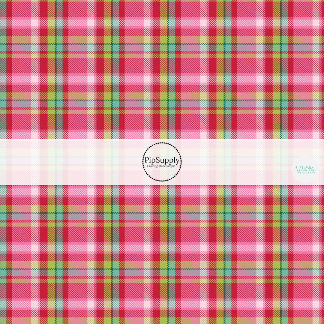 These winter themed pattern fabric by the yard features the following design elements: colorful Christmas tartan pattern. This fun themed fabric can be used for all your sewing and crafting needs!