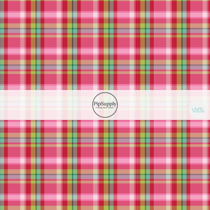 These winter themed pattern fabric by the yard features the following design elements: colorful Christmas tartan pattern. This fun themed fabric can be used for all your sewing and crafting needs!