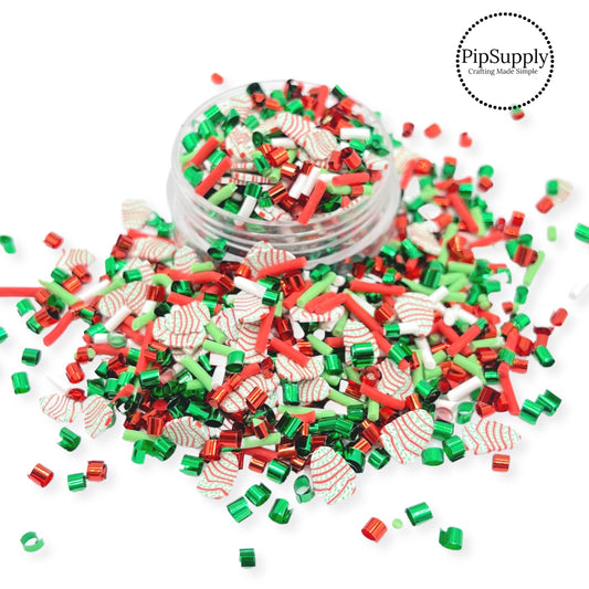 Red and green christmas tree cakes with sprinkles and confetti