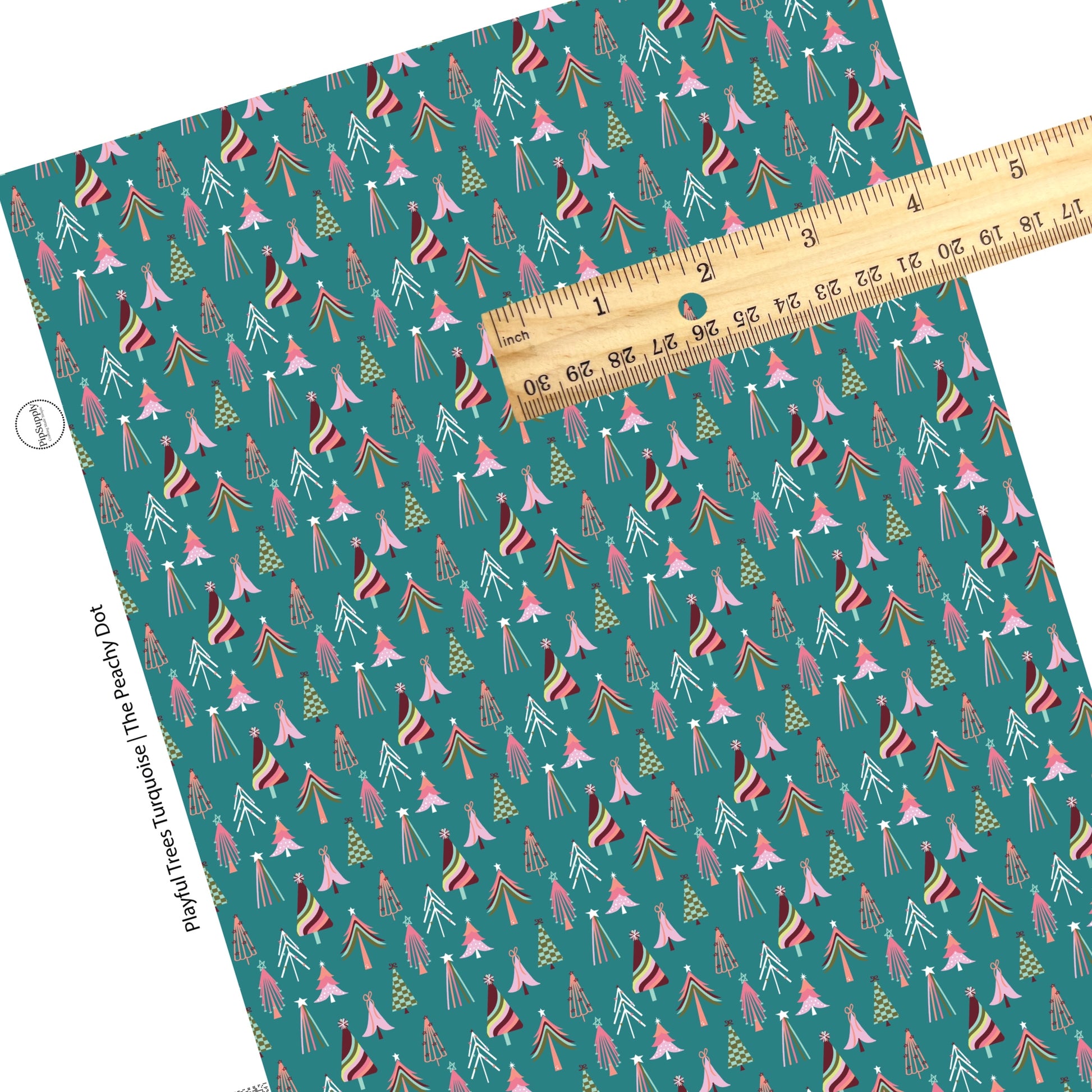 Multi patterned christmas trees on turquoise faux leather sheets