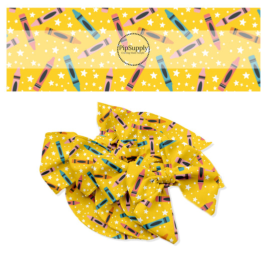 Multi crayons and white stars on yellow bow strip