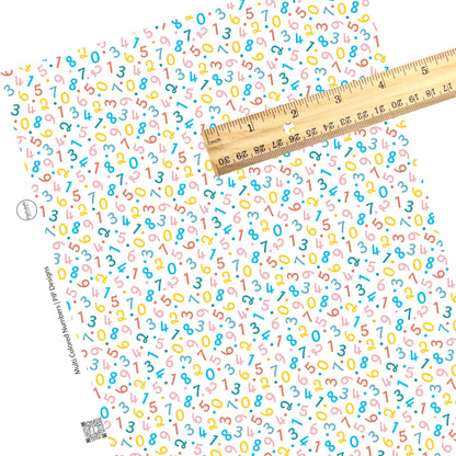 Scattered numbers and dots on white faux leather sheets