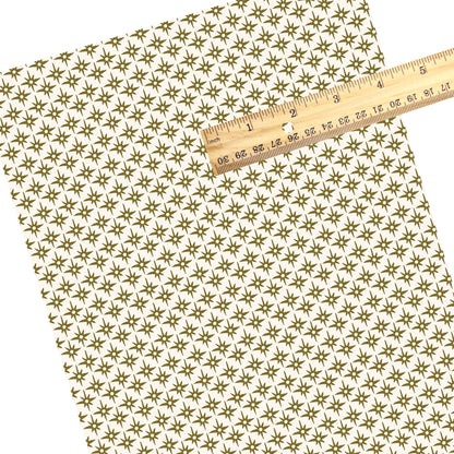 These summer faux leather sheets contain the following design elements: green compass star pattern on cream. Our CPSIA compliant faux leather sheets or rolls can be used for all types of crafting projects.