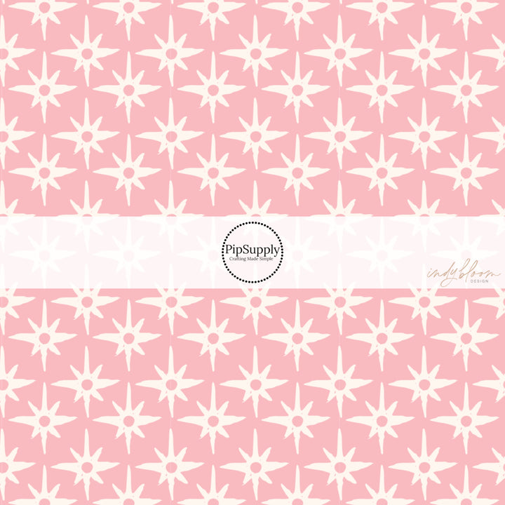 This summer fabric by the yard feature compass star pattern on pink. This fun summer themed fabric can be used for all your sewing and crafting needs!