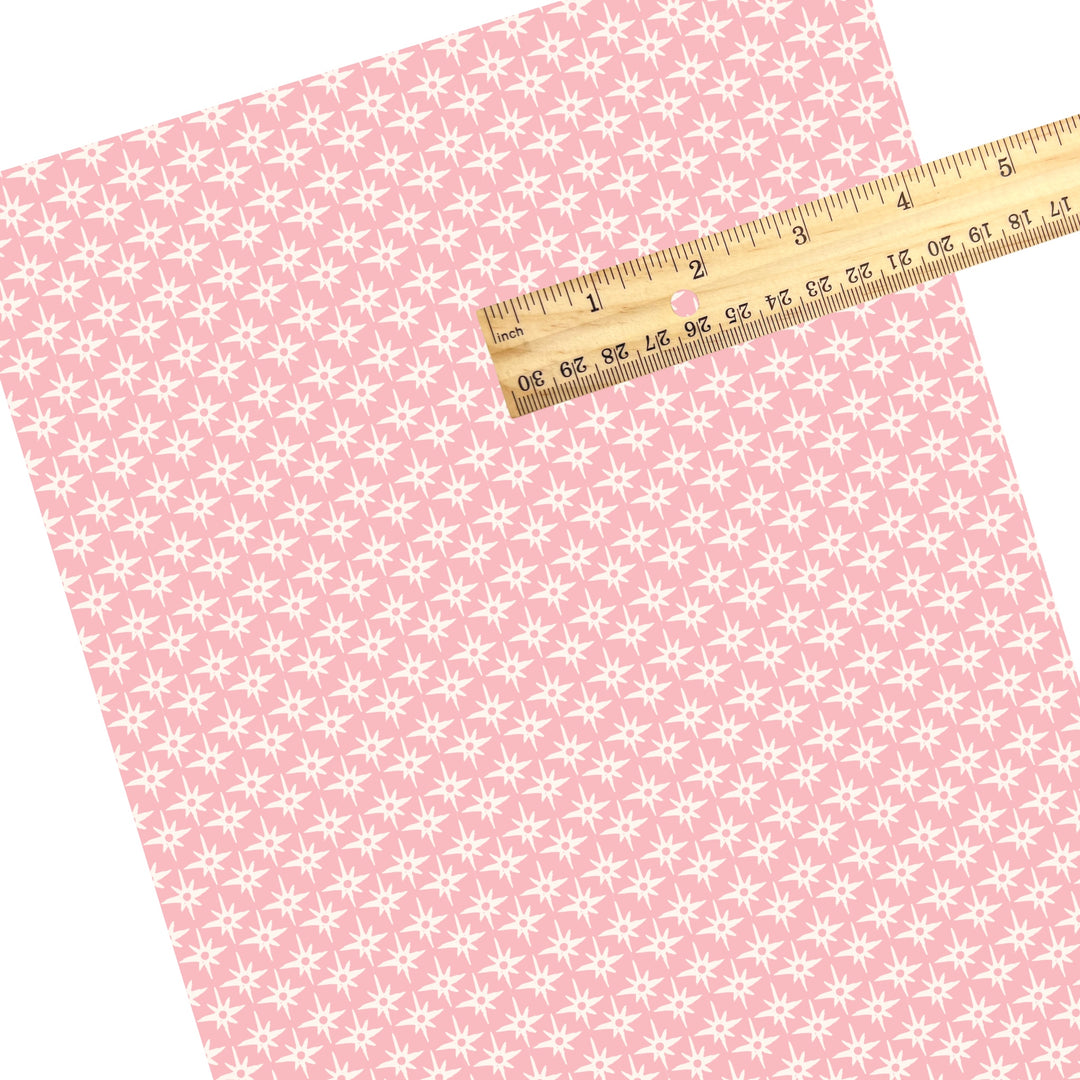 These summer faux leather sheets contain the following design elements: compass star pattern on pink. Our CPSIA compliant faux leather sheets or rolls can be used for all types of crafting projects.