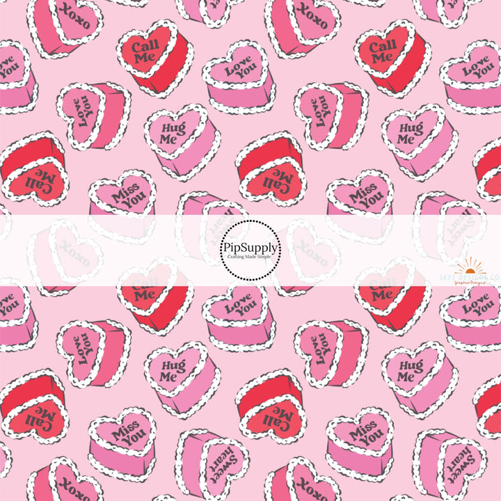 This holiday fabric by the yard features colorful conversation heart cakes. This festive pattern fabric can be used for all your sewing and crafting needs!