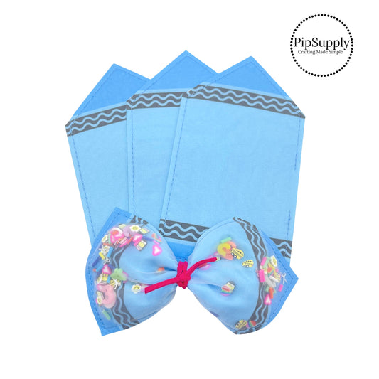 Blue patterned crayon shaker hair bow