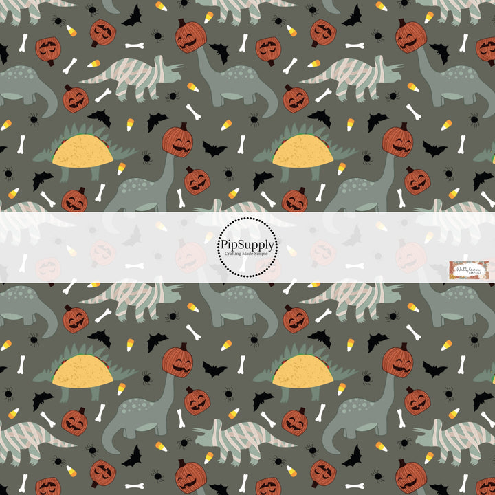 These Halloween themed pattern fabric by the yard features the following design elements: dinosaurs in costumes. This fun spooky themed fabric can be used for all your sewing and crafting needs!